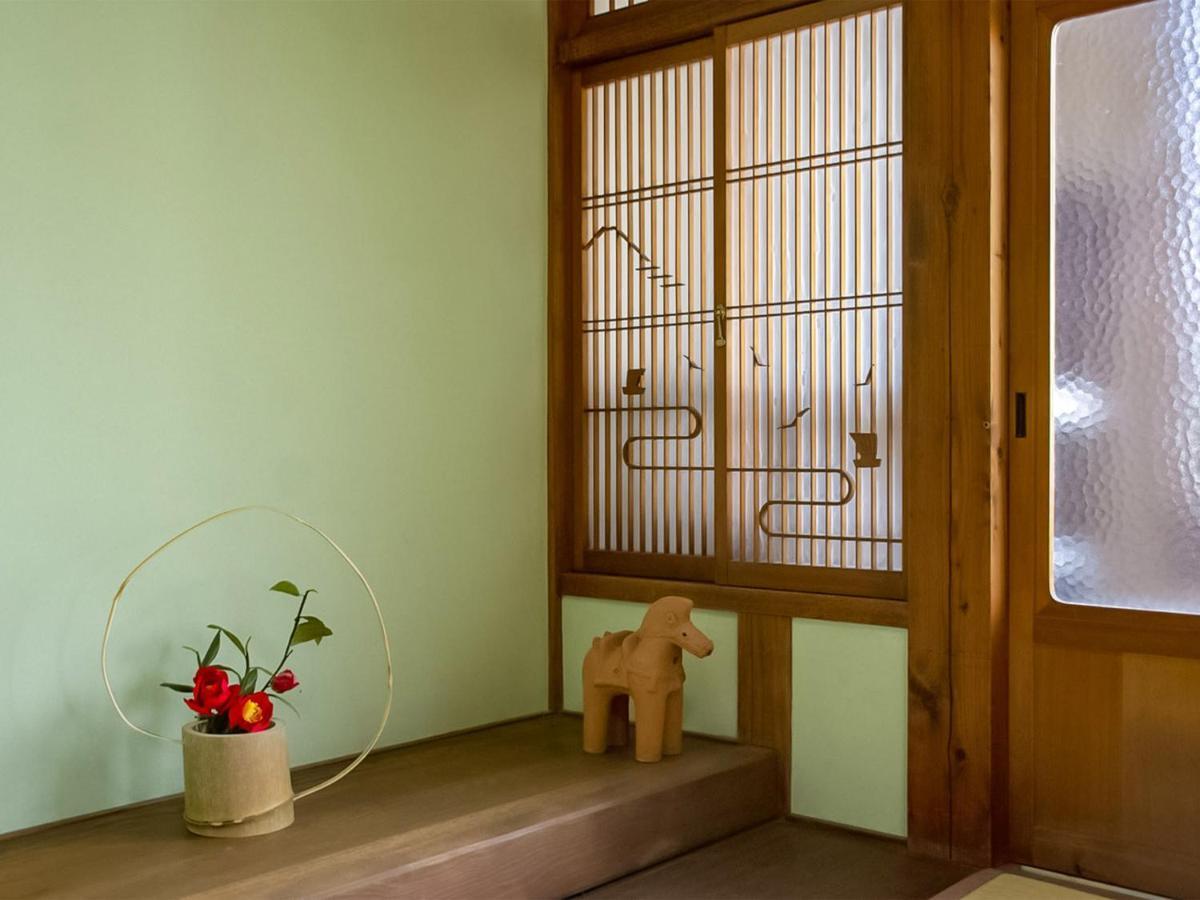 מלון Kamitondacho Guest Cafe Kuchikumano מראה חיצוני תמונה