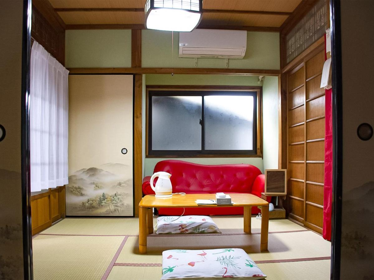 מלון Kamitondacho Guest Cafe Kuchikumano מראה חיצוני תמונה