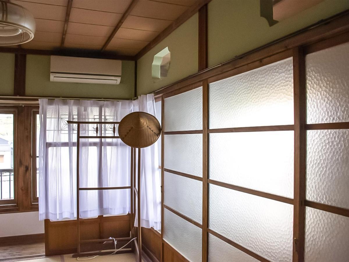 מלון Kamitondacho Guest Cafe Kuchikumano מראה חיצוני תמונה