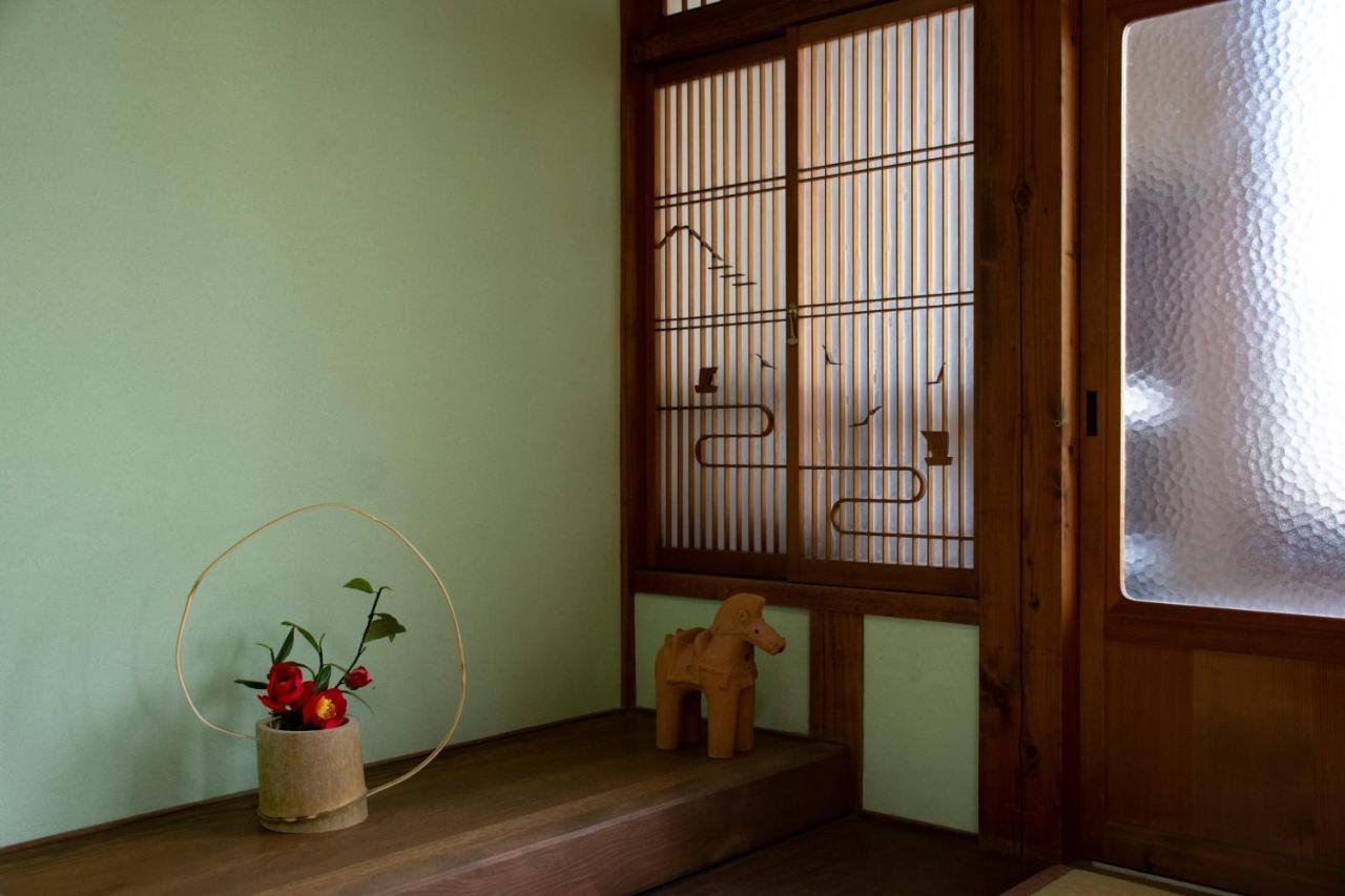 מלון Kamitondacho Guest Cafe Kuchikumano מראה חיצוני תמונה